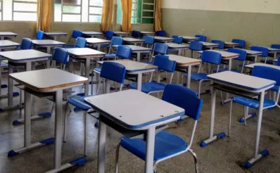 Classroom desks lined up ready to start classes at a school in Brazil.