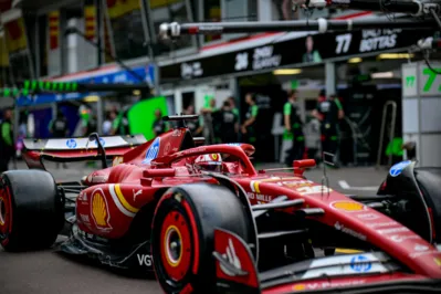 Ferrari's Monegasque driver Charles Leclerc drives in the pits of the Circuit de Monaco during the second practice session of the Formula One Monaco Grand Prix on May 24, 2024, two days ahead of the race. (Photo by ANDREJ ISAKOVIC / AFP)