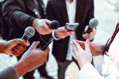 Female Leading Interview With Journalists Outside