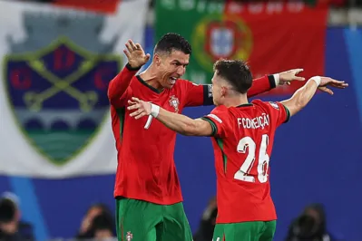 Imagem ilustrativa da imagem Portugal faz gol salvador no fim e vence em dia de recordes e CR7 apagado